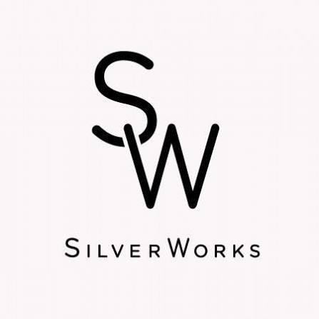 Positano Trad Corporation Silver Works logo